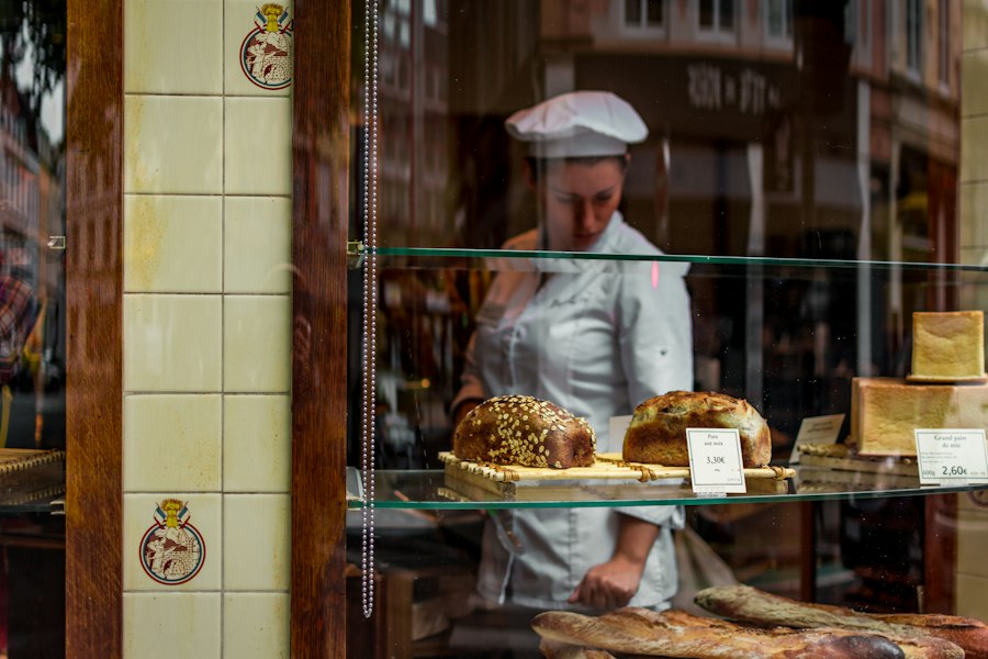 Baker behind a bakery window