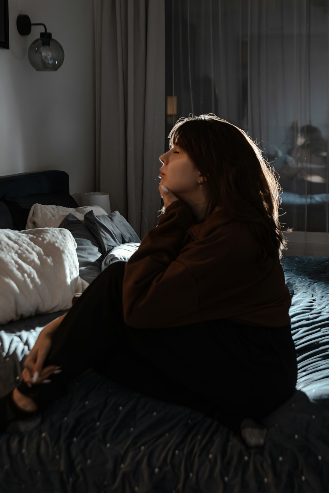 A woman relaxing at home in the evening